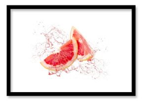 Red fresh ripe grapefruit with juice splash