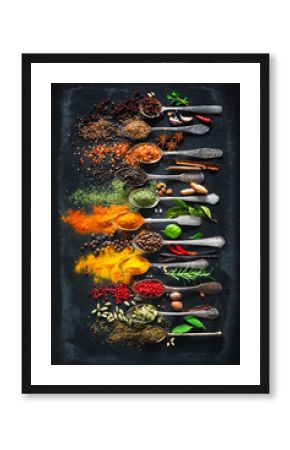 Herbs and spices for cooking on dark background