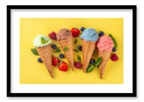  Colorful bright ice cream in waffle cones on bright background