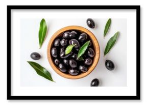 A wooden bowl filled with glistening black olives, surrounded by fresh green olive leaves on a pristine white surface.  The olives appear ripe and juicy, ready to be enjoyed. : Generative AI