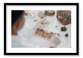 Scientist conducts a blood test in sterile laboratory setting, carefully placing a blood sample on glass slide for detailed examination to support diagnostics, healthcare medical breakthroughs