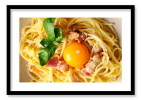 Tasty pasta carbonara on plate as background, closeup