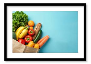 Grocery paper bag full fresh fruits vegetables on blue background. Variety of organic food. Healthy eating diet concept. Delivery service shopping concept. Flat lay, top view, copy space. Fresh food