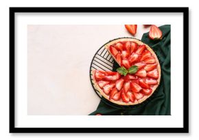 Stand of cut sweet strawberry tart with mint on white background