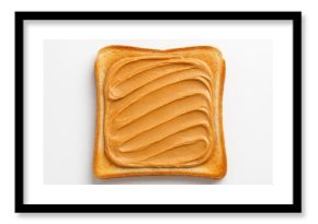 Apply creamy peanut butter evenly onto toasted bread slices on a white backdrop