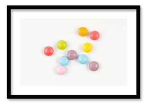 Scattered small candies isolated. Colorful dragees, multicolored glazed chocolate buttons