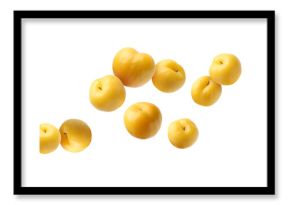Fresh ripe cherry plums falling on white background