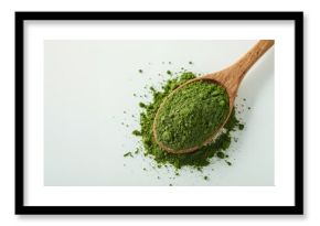 Wooden spoon filled with vibrant green spirulina powder and empty area for text