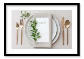 weekday wedding vibes Elegant table setting featuring a menu, decorative leaves, and stylish cutlery on a textured surface.