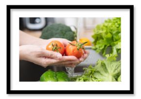 people washing raw vegetables at sink in the kitchen prepare ingredient for cooking