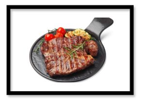 Delicious grilled beef steak with rosemary, zucchini and tomatoes isolated on white