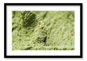 Close-up pistachio ice cream background scooping