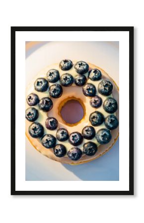 Gourmet Donut Topped with Fresh Blueberries and White Icing on a White Plate