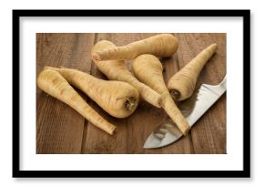 Parsnips roots and chefs knife