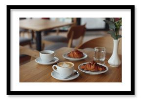Delicious breakfast served on wooden table in cafe