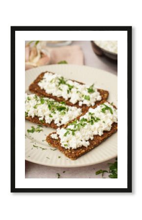 Plate with tasty cottage cheese and rye bread on light grunge background