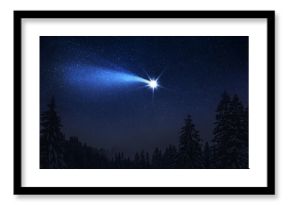 Christmas night. The first star lit up in the winter forest with snow and the night starry sky. Christmas Eve concept. Comet falls in the starry night sky