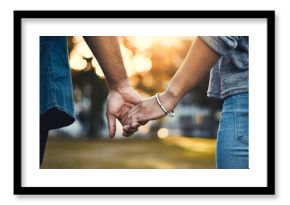 Couple, back and holding hands outdoor for love, relationship and date together with loyalty. Man, woman and commitment as romantic walking with trust, support and care in street for happiness