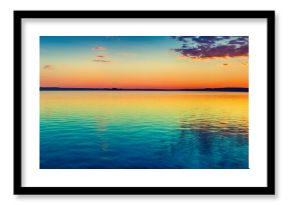 Sunset over the lake. Amazing panorama landscape