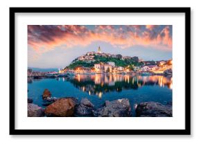 Breathtaking evening cityscape of Vrbnik town. Dramatic summer seascape of Adriatic sea, Krk island, Croatia, Europe. Beautiful world of Mediterranean countries. Traveling concept background.