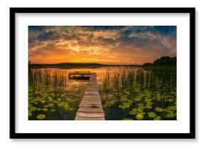 Panorama of beautiful sunrise over lake