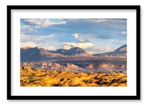 Petrified Dunes and La Sal mountain range panorama in Arches National Park, Utah. The formations were produced when ancient sand dunes hardened into stone.