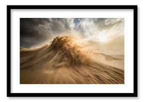 Strong winds stir up sand in Liwa desert, creating dramatic patterns at sunset, Strong wind blowing the sand in the Liwa desert in Abu Dhabi, UAE