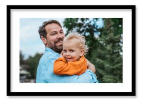Portrait of dad and child enjoying time together