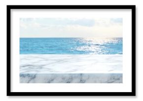 Empty glossy white marble table top with blur sky and sea boekh background,banner mock up template for display of product
