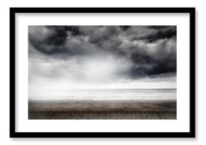 Boardwalk is extending over wet sand toward calm sea under brooding storm clouds in flat design