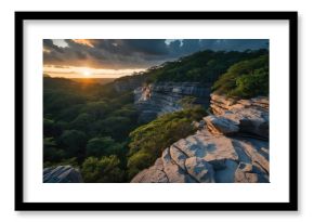 Showing layered plateau rock catching sunset light over forest canopy, cumulus clouds, copy space