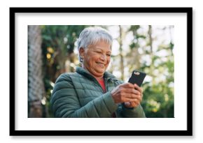 Nature, happy and senior woman with phone for texting, communication or mobile app for weekend trip. Smile, forest and elderly female person with cellphone for chatting online outdoor on holiday.