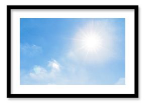 Bright sunlight shining in clear blue sky with lens flare and soft clouds, symbolizing freshness, good weather, and natural energy