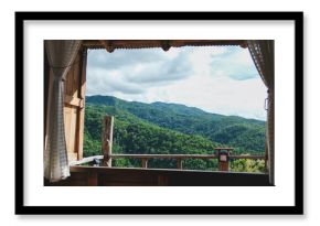 Landscape view of greenery forest and mountain views outside the window