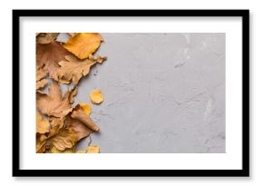 Autumn composition. Pattern made of dried leaves and other design accessories on table. Flat lay, top view
