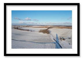 Bird's-Eye Perspective of Frost-Covered Farmland. Seasonal Agricultural Scenery.
