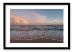 Dawn breaking above the ocean with breathtaking cloud formations