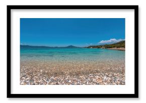 Pebble stone mosaic featuring black and white stones at a historic thermal spring