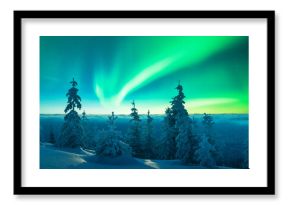 Fairy winter mountains with snowy fir-trees and incredible Northern lights in starry sky. Christmas nightscape with Polar lights. Aurora Borealis