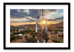 aerial view, cellular antenna at sunset, communications tower, mountain range,