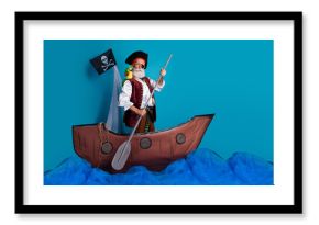 Photo of old man theater actor wearing pirate costume traveling sailing wooden boat decoration isolated on blue color background