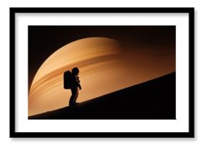 Astronaut exploring a new planet with a gas giant visible in the sky