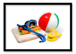 Beach ball with flip flops and beach accessories on white background