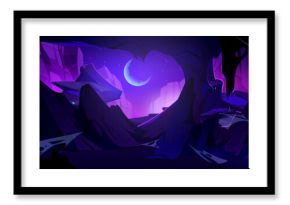 View from inside of cave on rocky cliff mountains at night with crescent moon on sky. Cartoon vector illustration of midnight landscape through underground grotto entrance hole. Empty stone cavern.