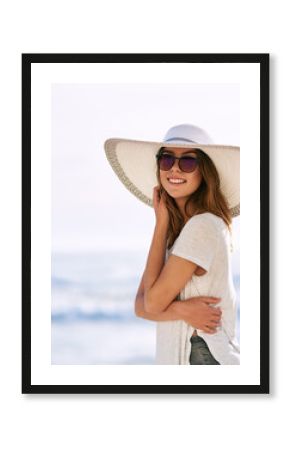 Sunglasses, happy and portrait of woman at beach for summer holiday, tourism and adventure in Miami. Outdoor, smile and relax by ocean with hat for travel, weekend trip and confidence on vacation