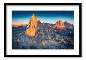 Majestic morning view from flying drone of Ra Gusela peak, province of Belluno in Italy, Europe. Gorgeous autumn sunrise in Dolomite Alps. Beauty of nature concept background.