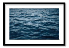 Calm ocean waves at dusk.