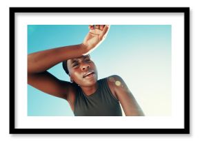 Fitness, tired and black woman wipe sweat for health, wellness or exhausted by blue sky. Runner, fatigue and space on break outdoor for intense exercise, breathing or rest for recovery with low angle