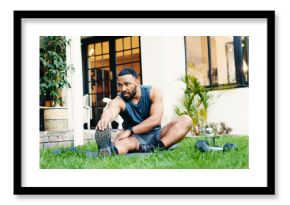 Outdoor, stretching and man with fitness, health and warm up with wellness, home and exercise. House, person and athlete with training, nature and calm with routine, morning and body workout