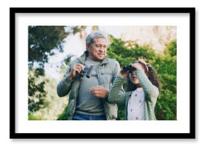 Grandfather, girl and binocular in park for travel, sightseeing or search with view for bonding. Old man, child and explore for adventure, bird watching or together in nature with family in Mexico